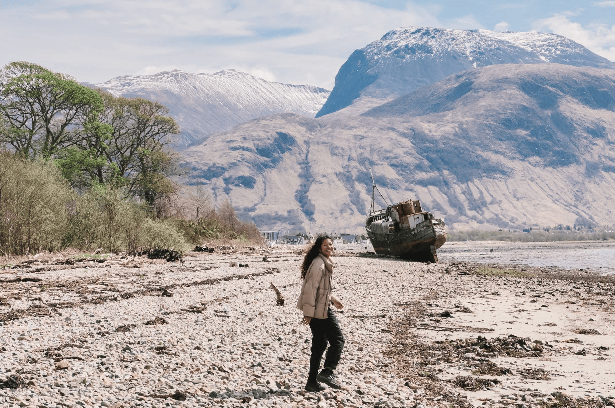 View of Corpach Caol Shipwreck in Fort William with snowcapped mountains in the background