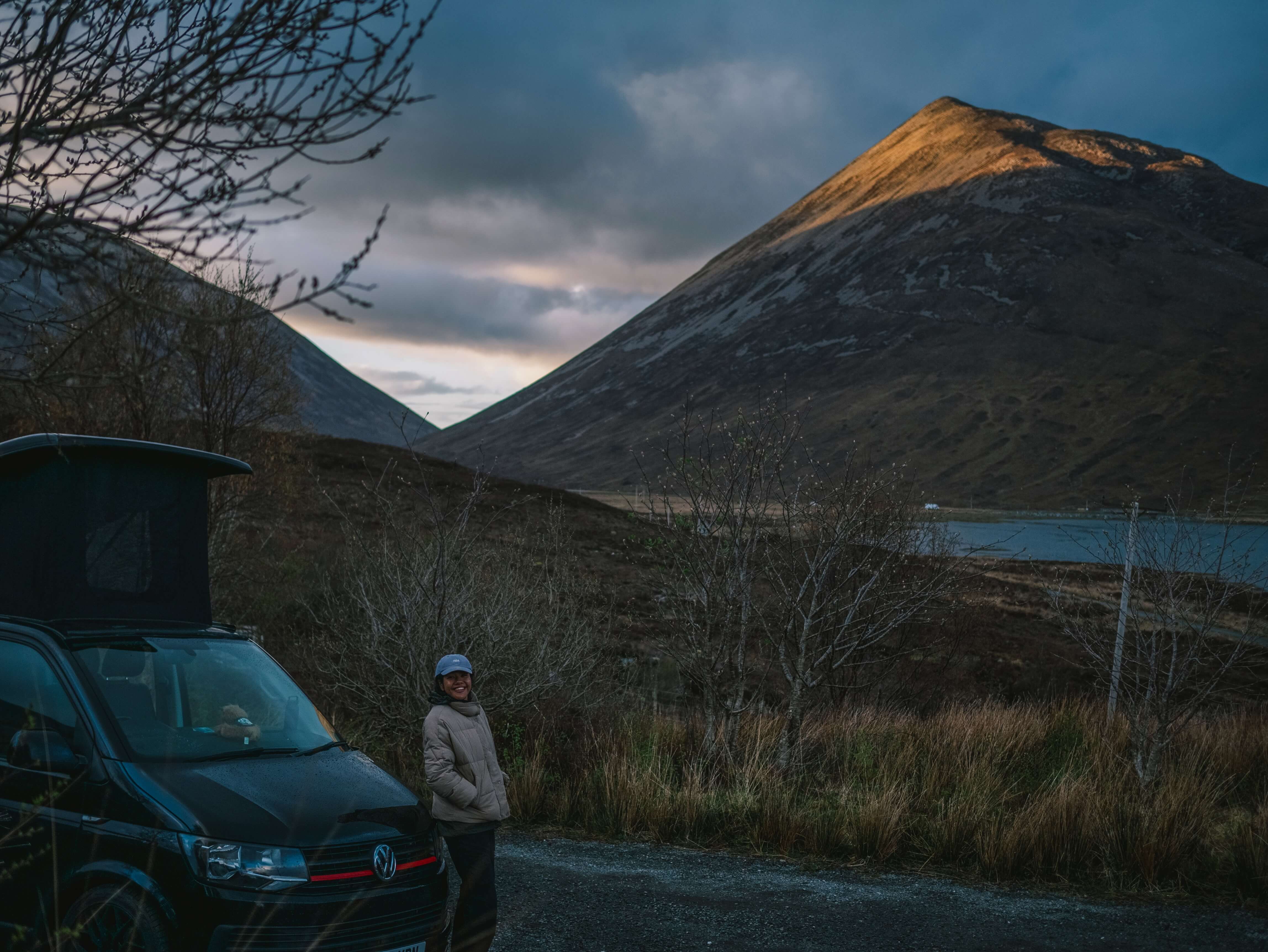 Campervan parked with a beautiful sunset